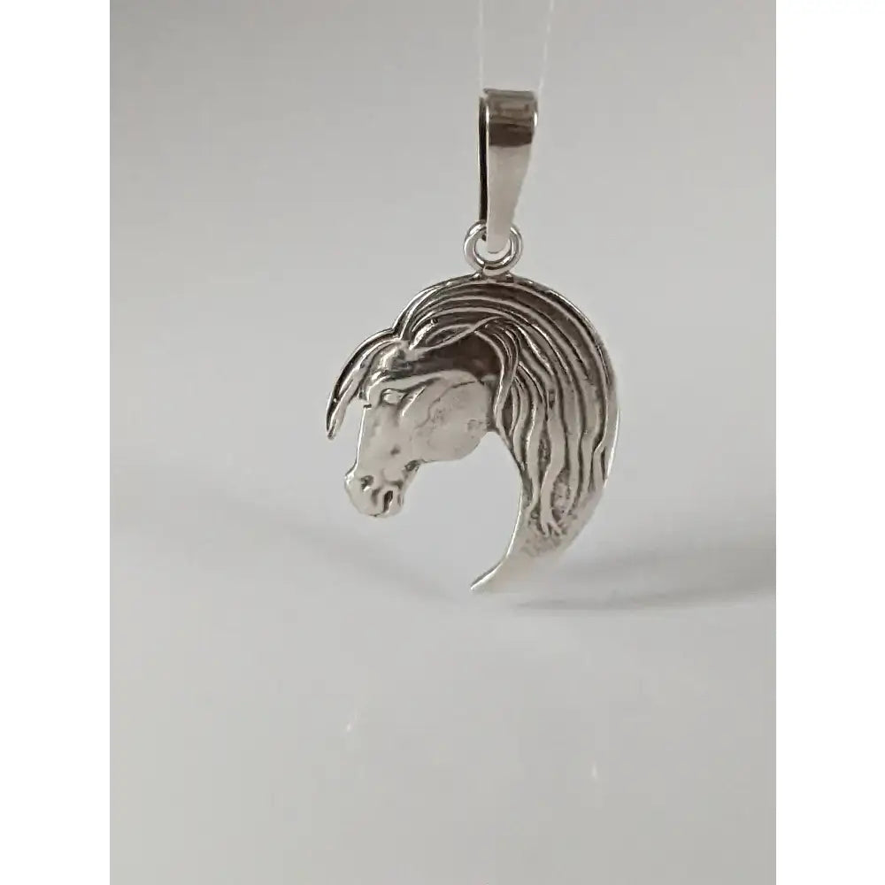 Silver steed long horse head silver pendant with detailed long mane and polished metallic finish