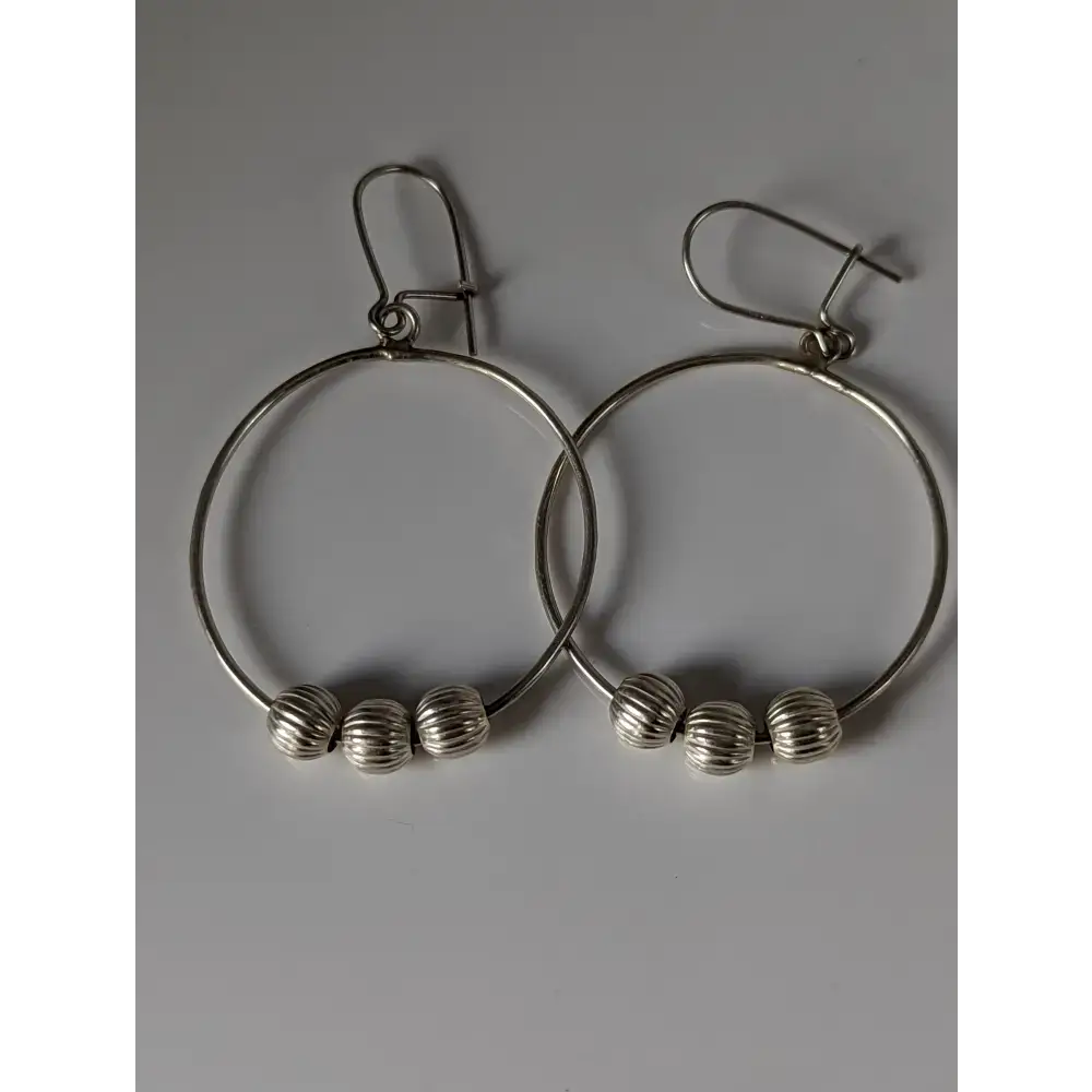 Silver Steed Loop with Buds Dangling Earrings Earrings