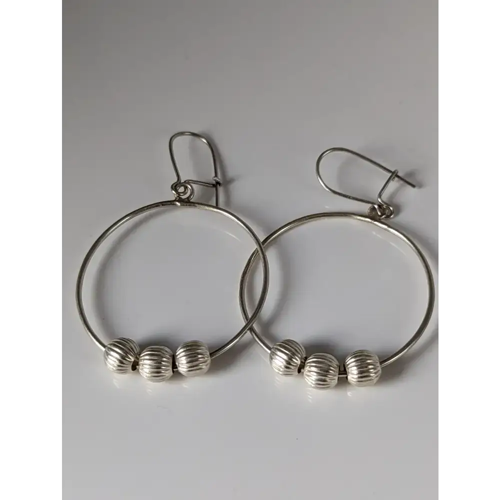 Silver Steed Loop with Buds Dangling Earrings Earrings