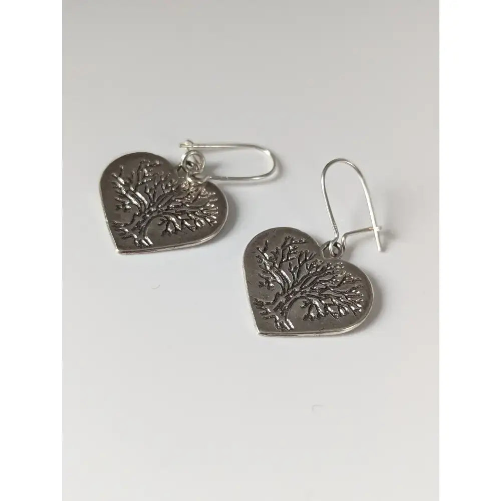 Silver steed love trees dropped earrings silver heart shaped with an intricately engraved tree design