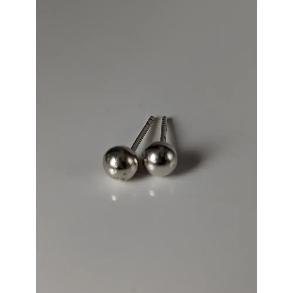 Silver steed medium silver ball stud earrings with sleek polished metallic spheres and slender posts