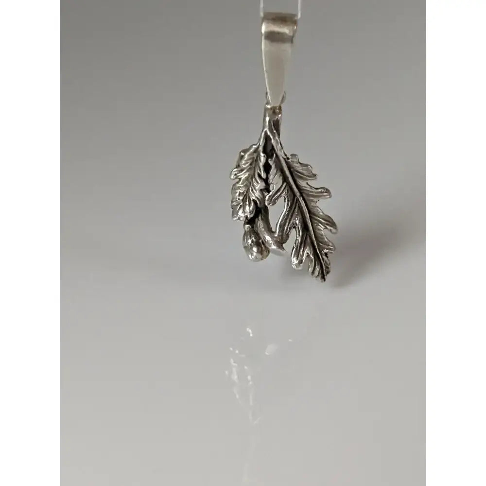 Silver steed oak leaf silver pendant featuring detailed sterling silver oak leaf with veining and a small acorn charm