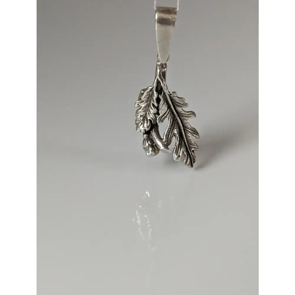 Silver steed oak leaf silver pendant featuring detailed sterling silver oak leaf with veining and a small acorn charm