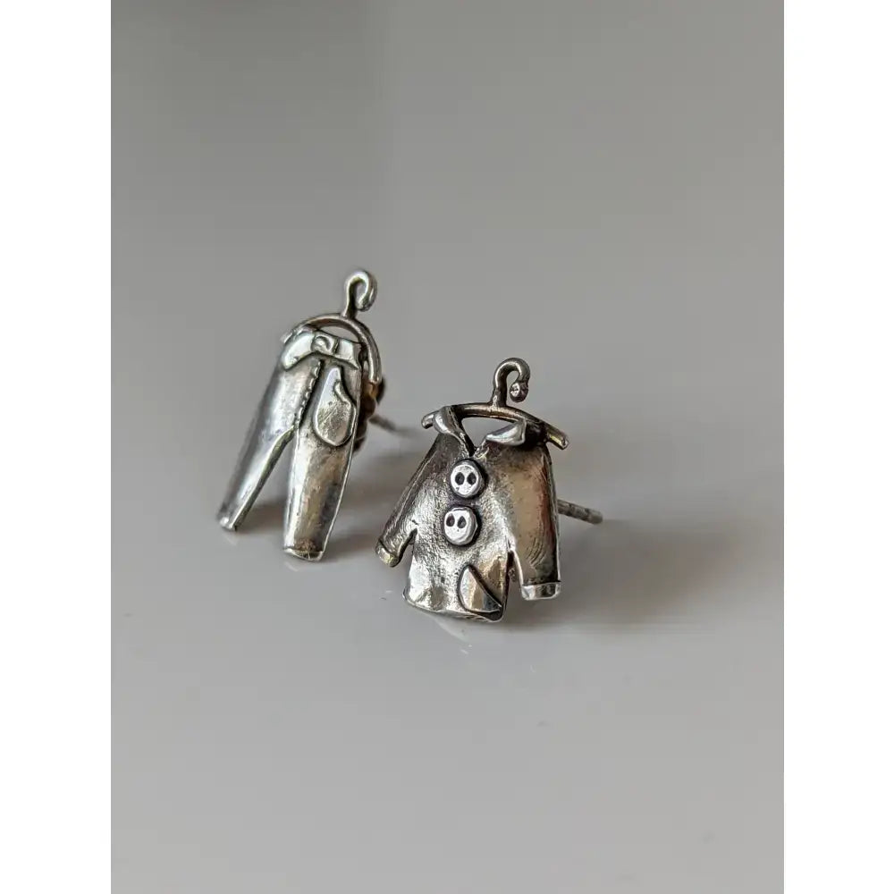 Silver steed pajama stud earrings feature silver jeans and shirt shaped studs perfect for equestrian jewelry fans