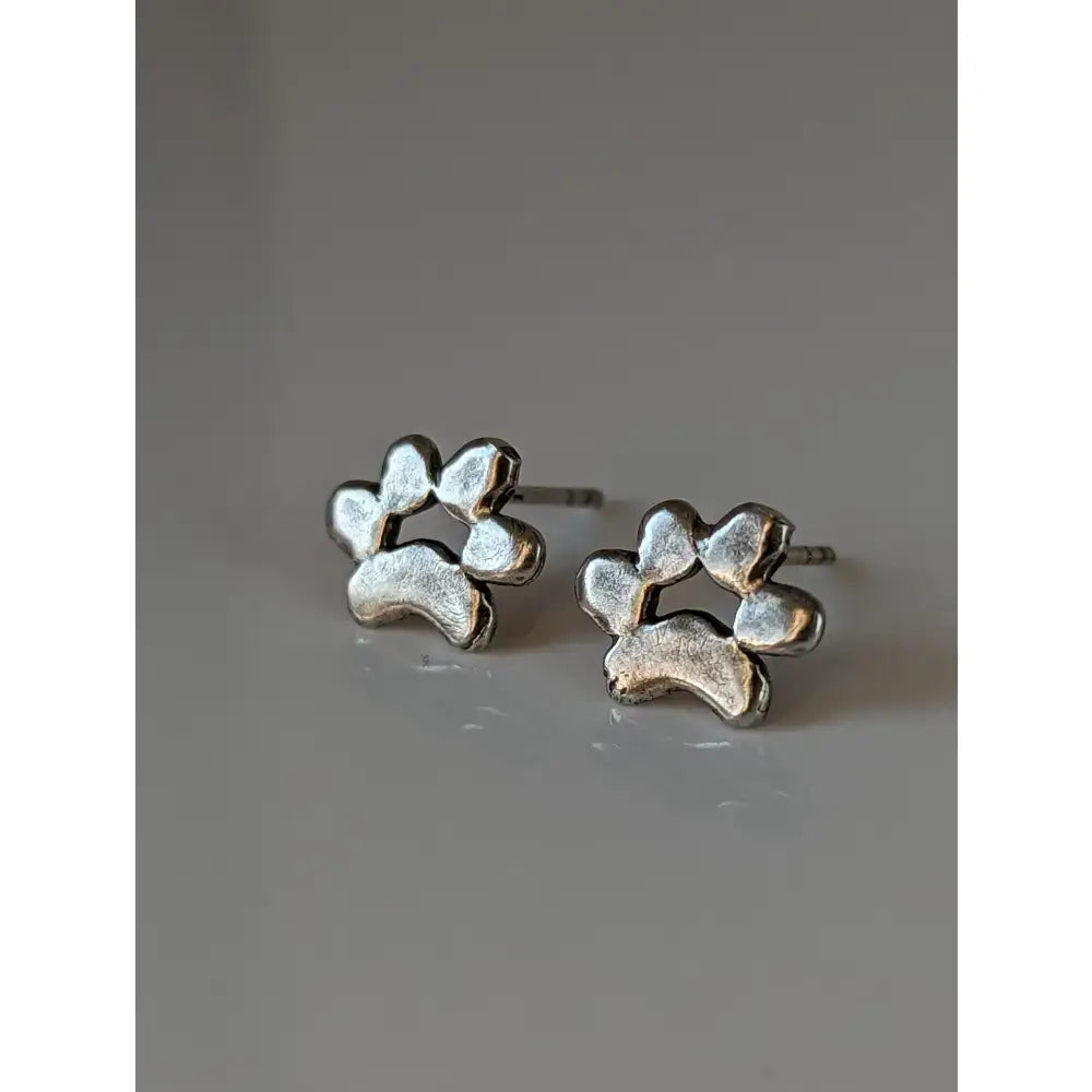 Silver steed paw print large silver stud earrings with a textured handcrafted finish in silver metal