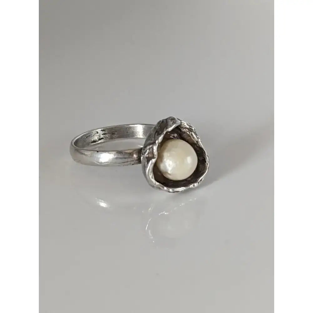 Silver steed pearl flower silver ring with textured organic shell setting and creamy white pearl in equestrian jewelry style