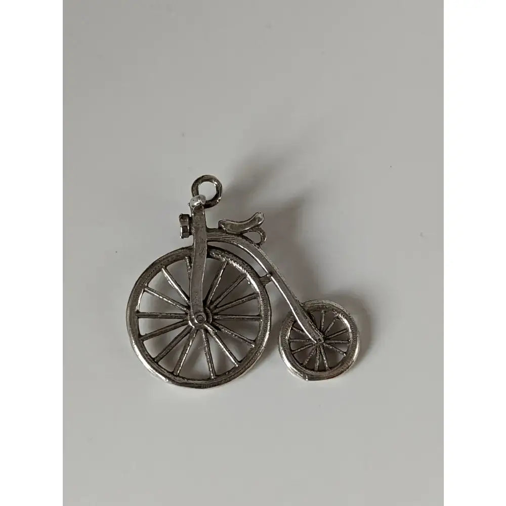Silver steed penny vintage penny farthing bike silver pendant shaped like a classic bike in metal