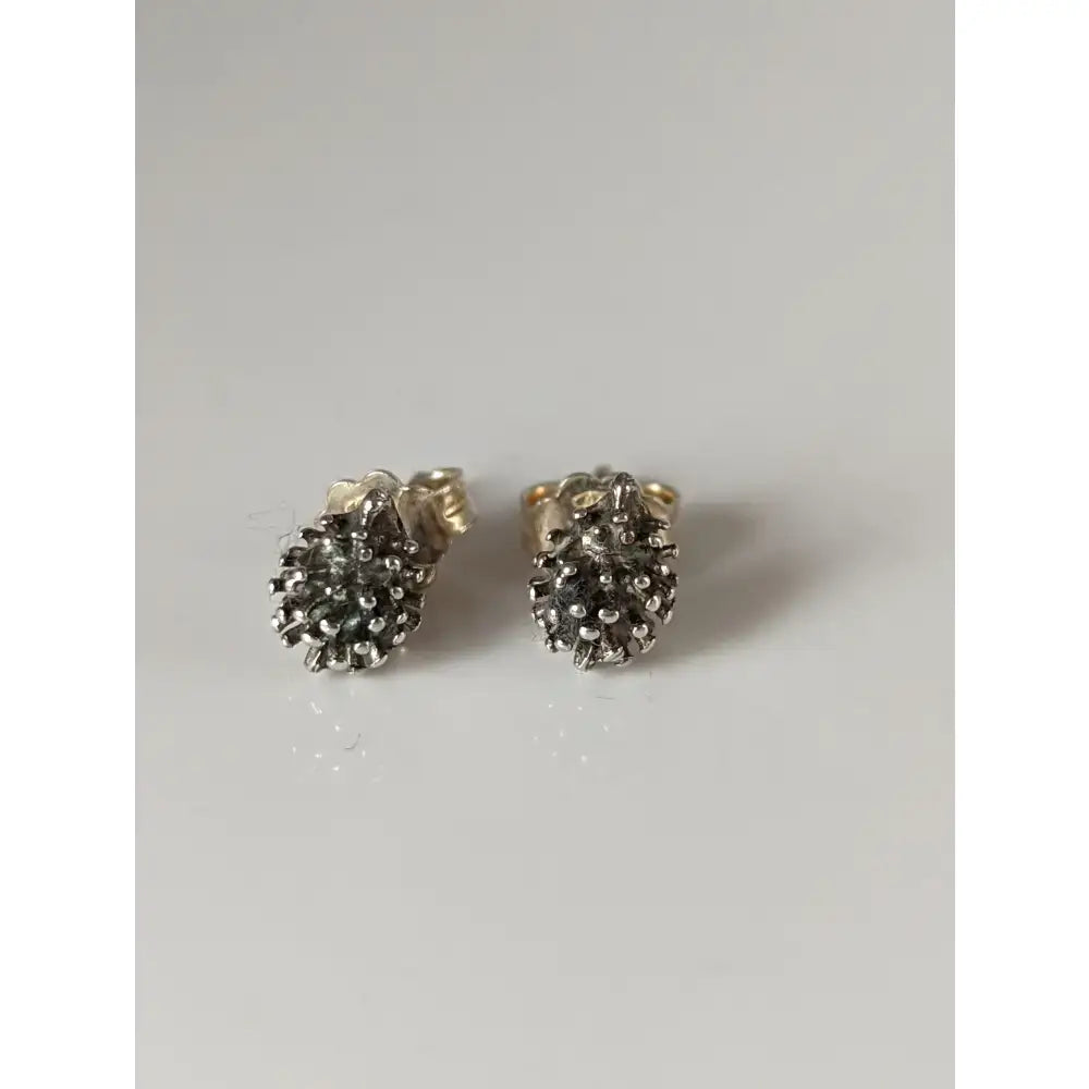 Silver steed pine cone stud earrings textured silver stud earrings with a beaded pine cone design