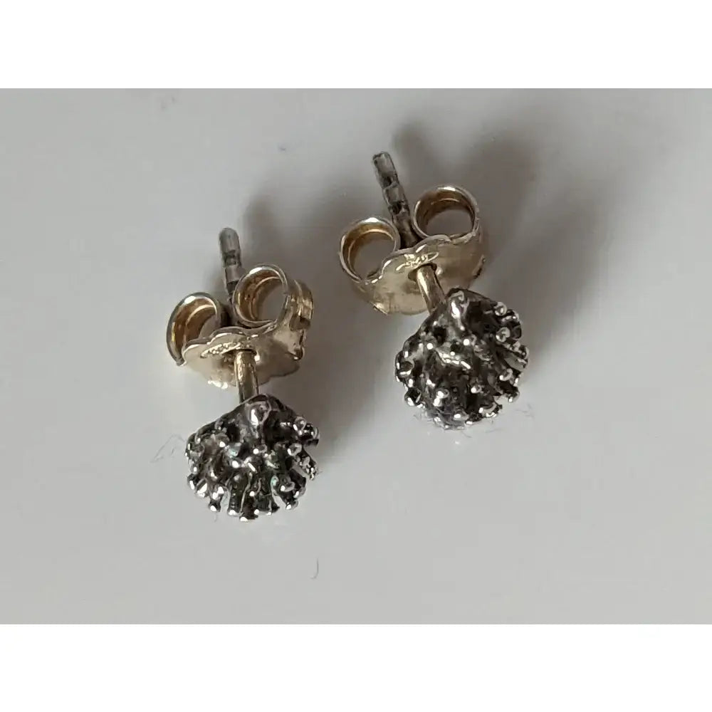 Silver steed pine cone stud earrings with silver-toned textured diamond-like embellishments stud earrings