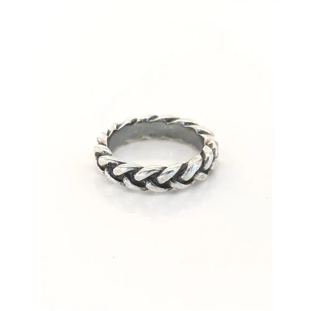 Silver steed plaited ring featuring a silver-toned braided chain design with a textured interwoven look