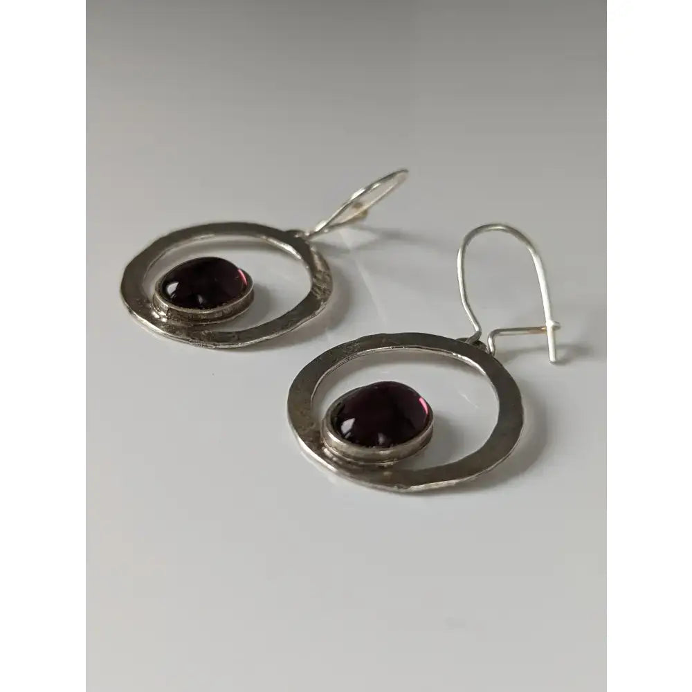 Silver steed purple crystal loop dropped earrings with faceted deep purple gemstone in textured silver hoop frame