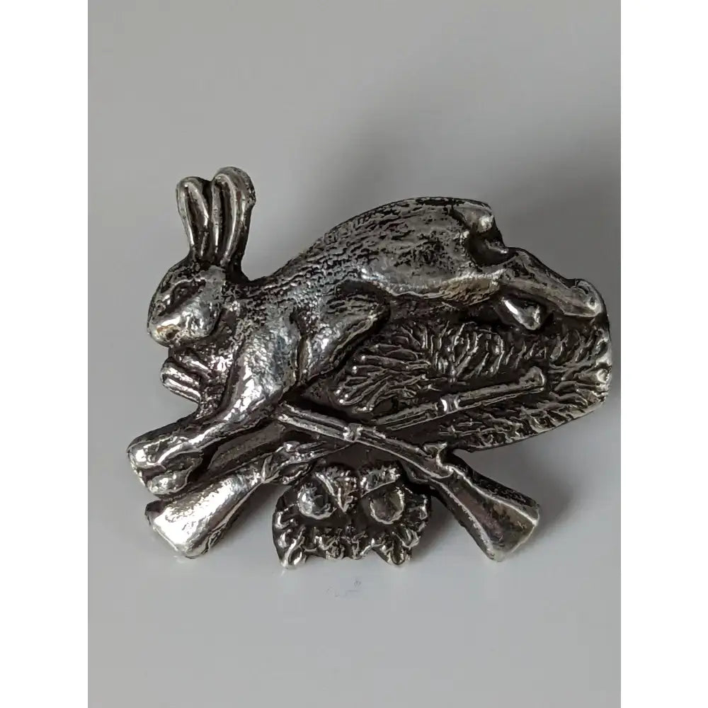 Silver steed sterling silver brooch with a detailed hare leaping over rifles and an owl skull for rabbit hunting silver fans