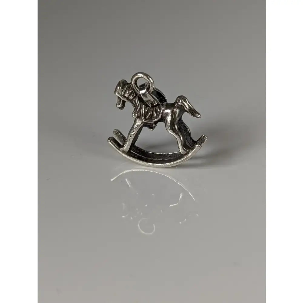 Silver steed rocking horse silver pendant with polished metallic finish and detailed craftsmanship in equestrian jewelry