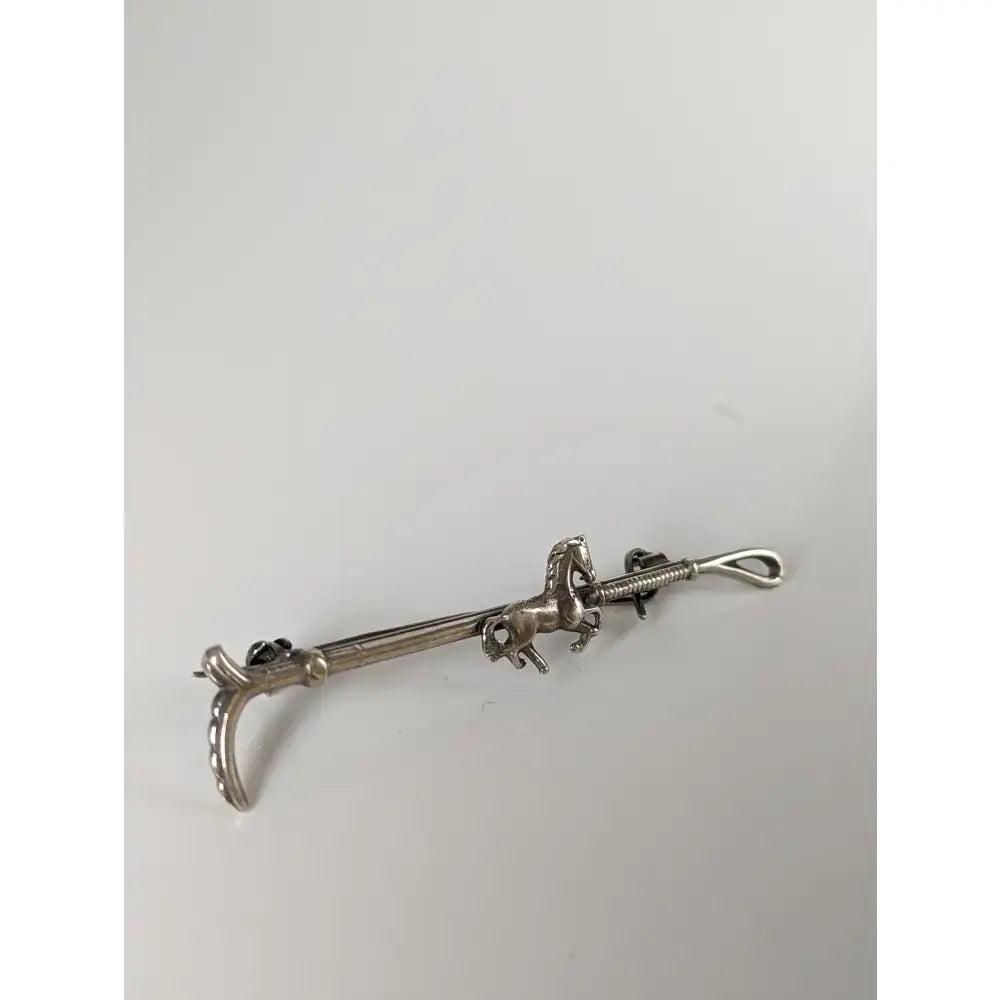 Silver steed running horse brooch in silver with intricate detailing on a slender brooch stock tie pin