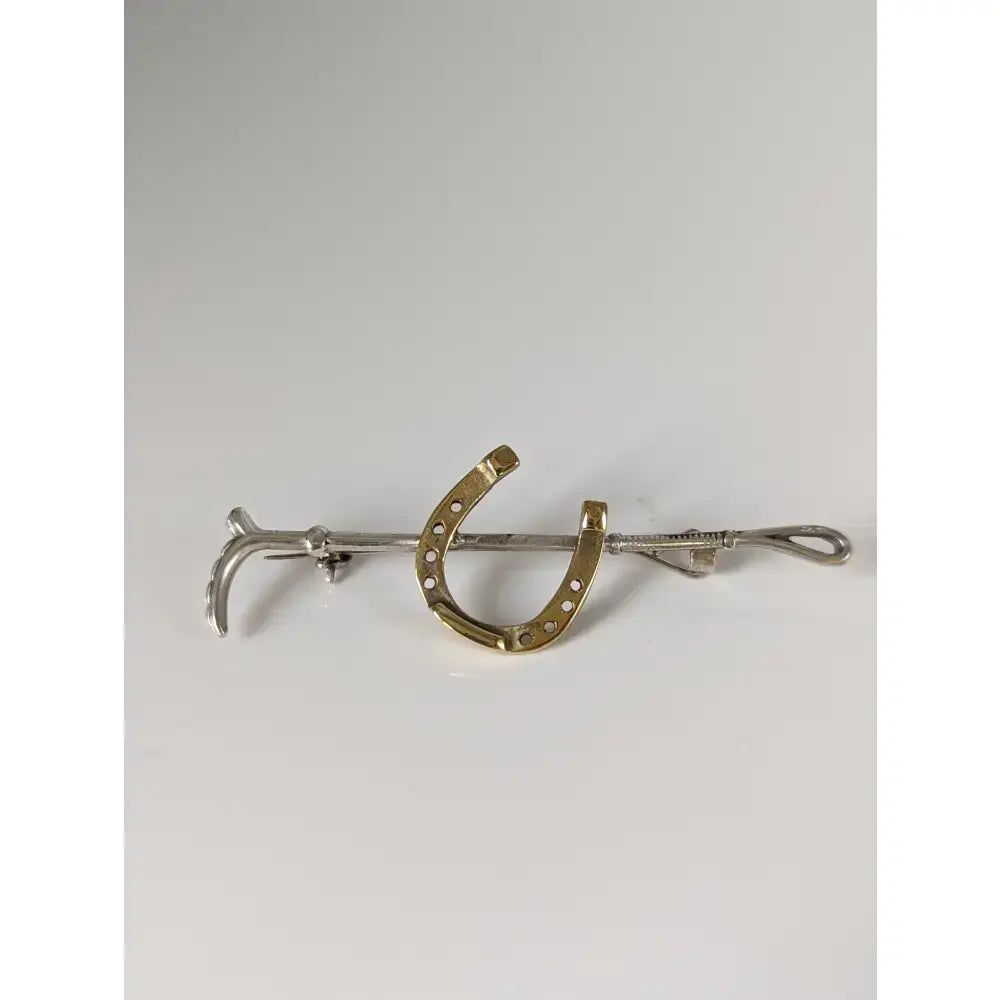 Silver steed shoe and cane gold brooch stock tie pin with polished silver and gold horseshoe and circular indentations