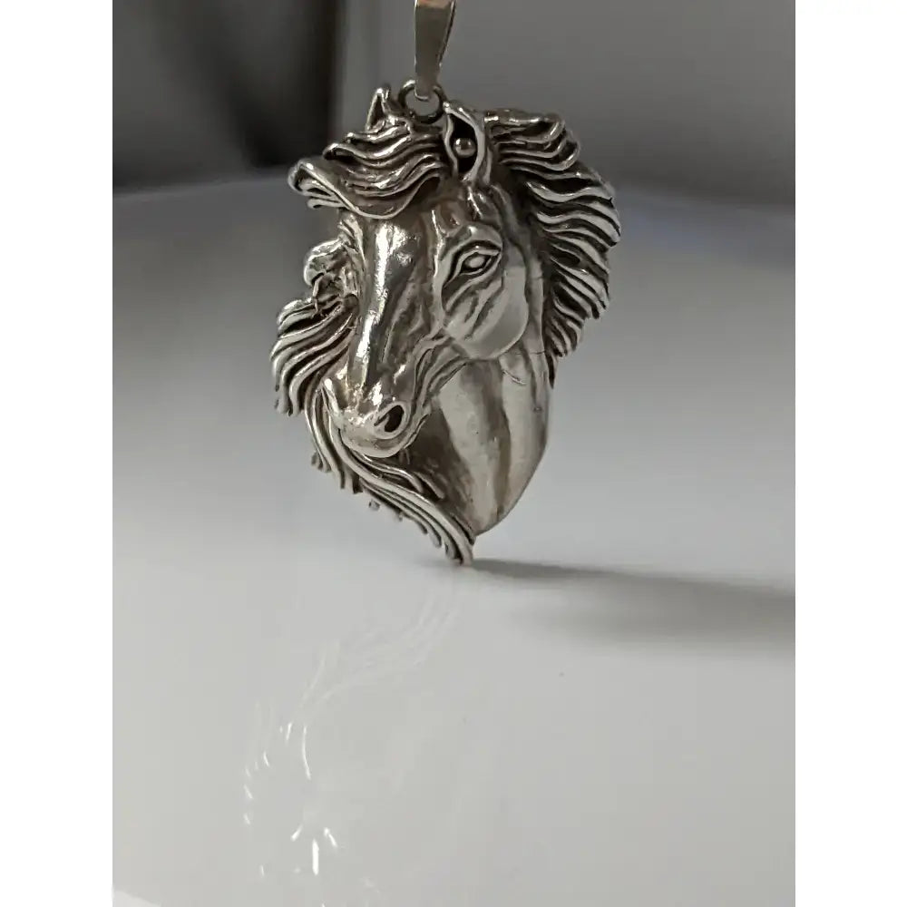 Silver steed signature horse head pendant in polished silver with detailed mane and expressive eyes horse head pendant