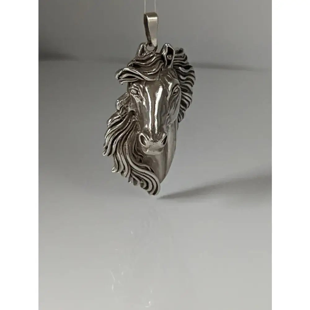 Silver steed signature horse head pendant with polished silver finish and detailed mane in a sleek horse head pendant design