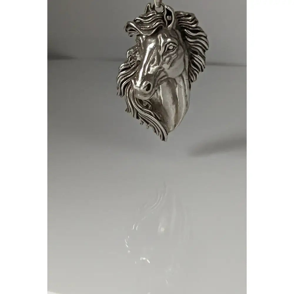 Silver steed signature horse head pendant in silver with detailed mane and facial features for stylish wear