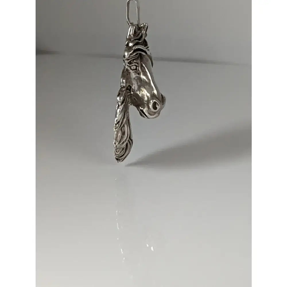 Silver steed signature horse head pendant in polished silver with intricate detailing perfect for everyday wear