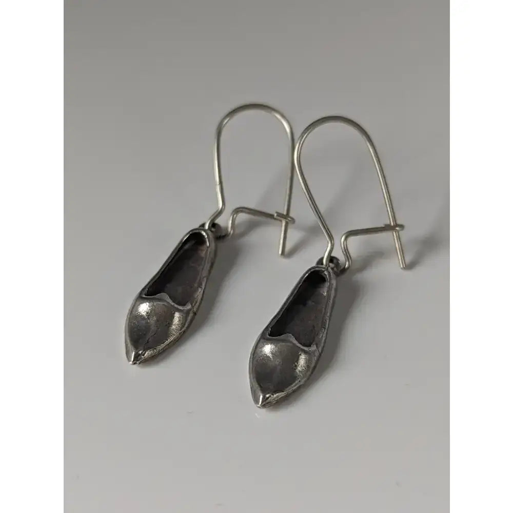 Silver steed slipper silver dropped earrings shaped like unique handmade miniature high-heeled shoes in polished silver