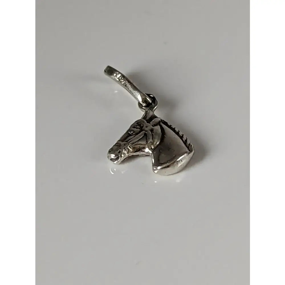 Silver steed small horse head silver pendant with detailed engraving and polished finish in silver pendant style