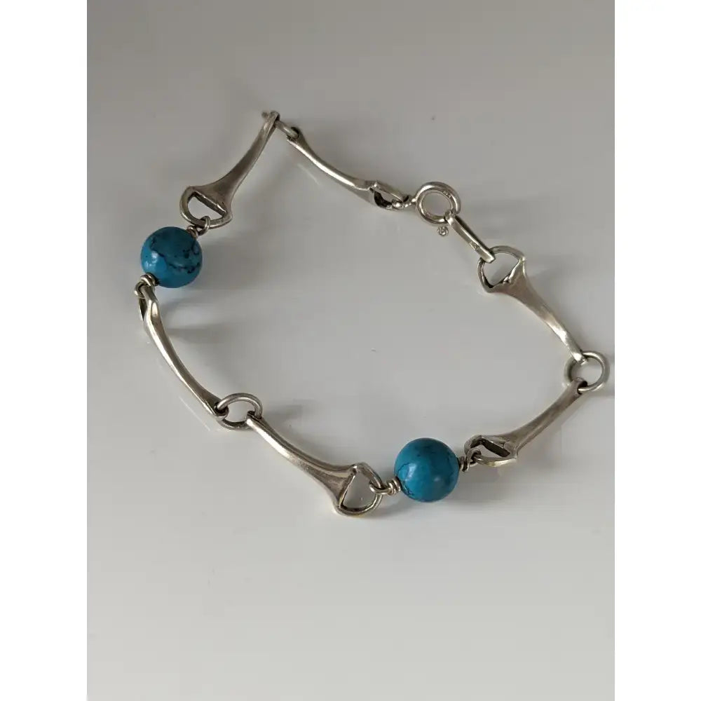 Silver steed snaffle solid silver bracelet with turquoise beads in vibrant blue for stylish everyday wear