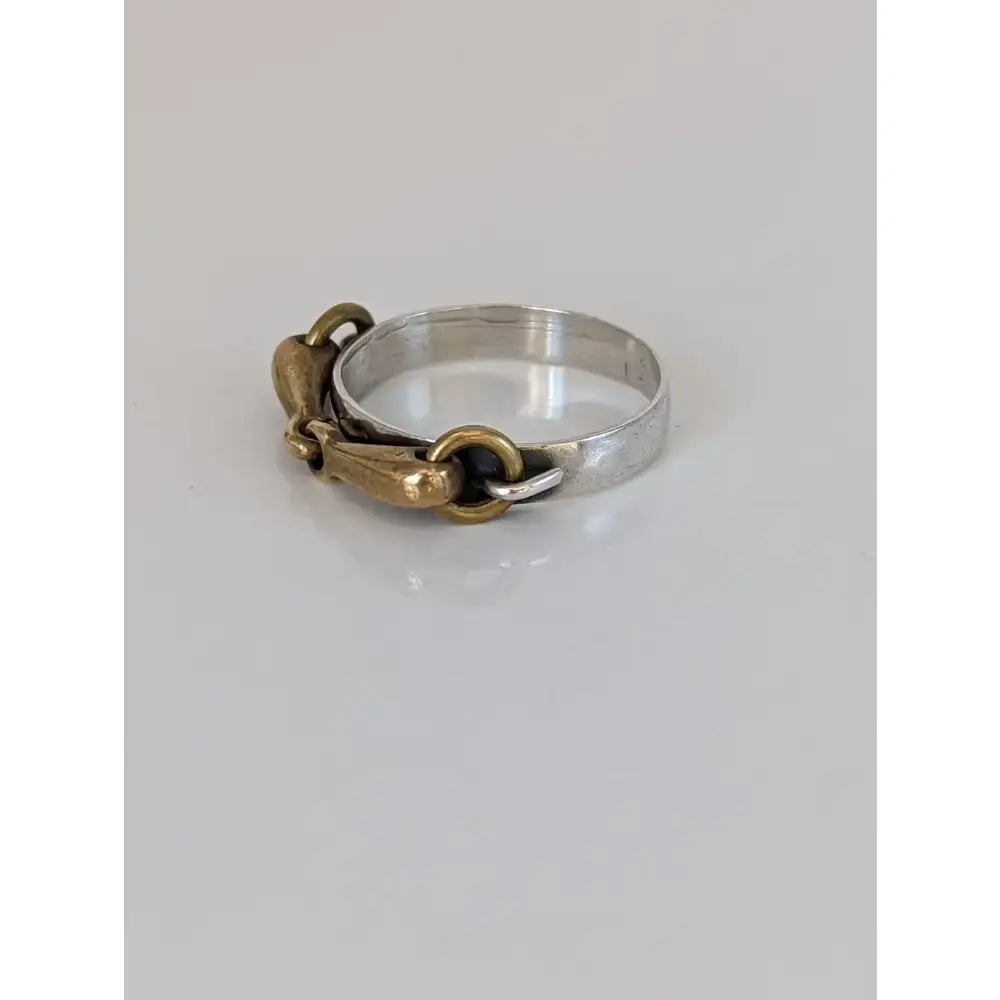 Silver steed snaffle silver and gold toned horsebit ring with polished metallic silver band
