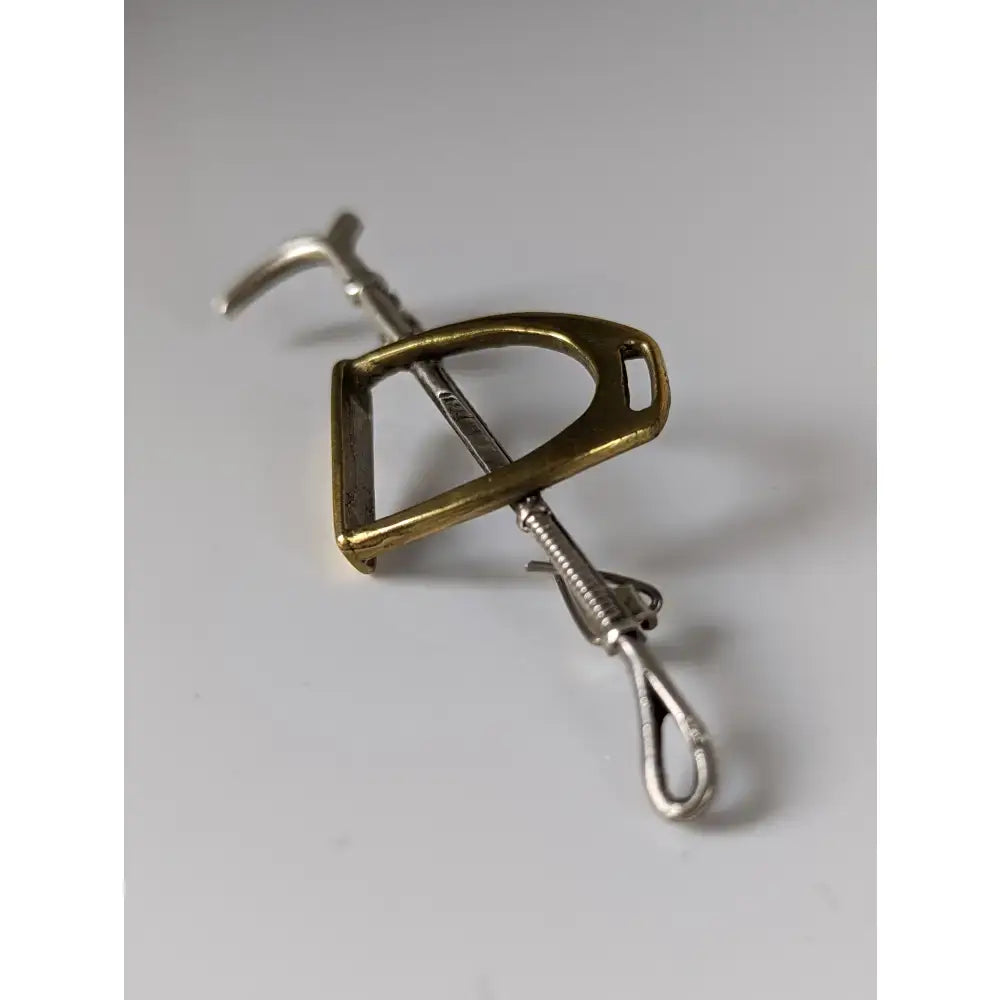 Silver steed stirrup handmade silver cane brooch with brass and silver spring loaded horse saddle stirrup design