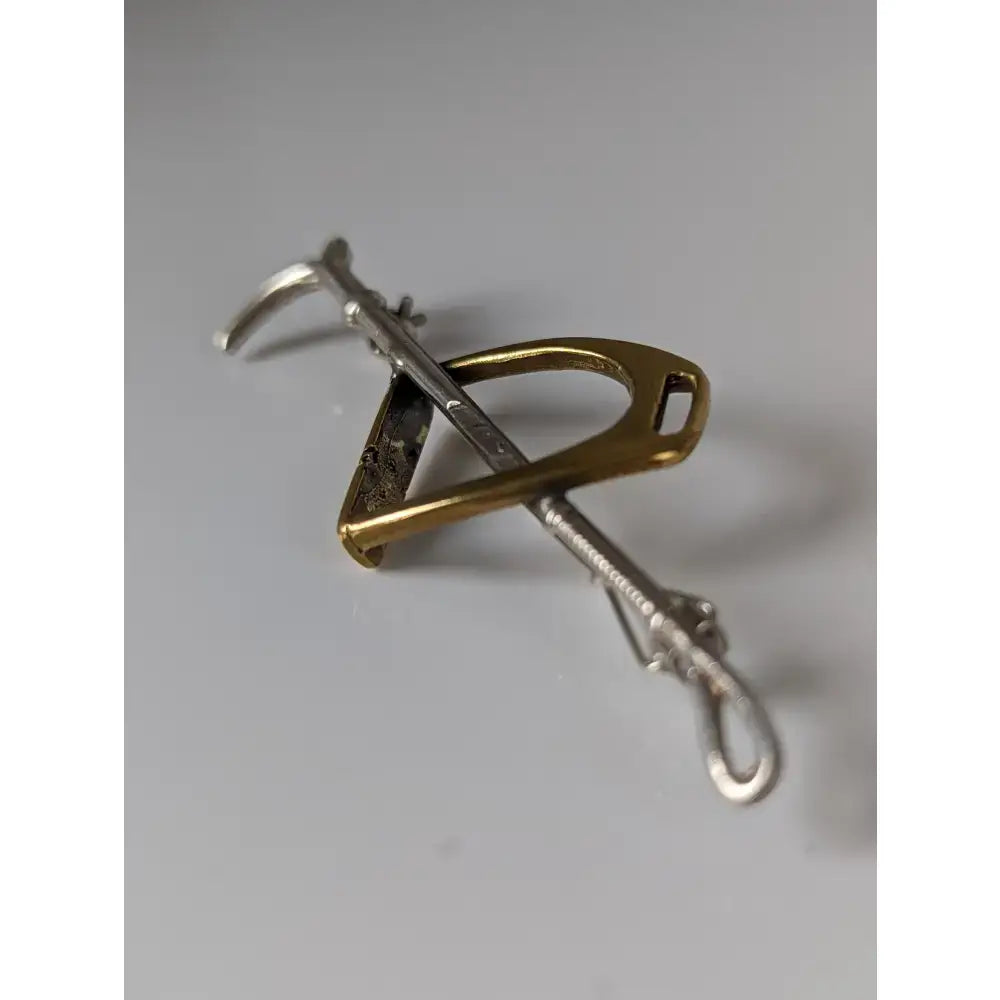 Silver steed stirrup handmade silver gold and silver horsebit style metal clip cane brooch with engraved design