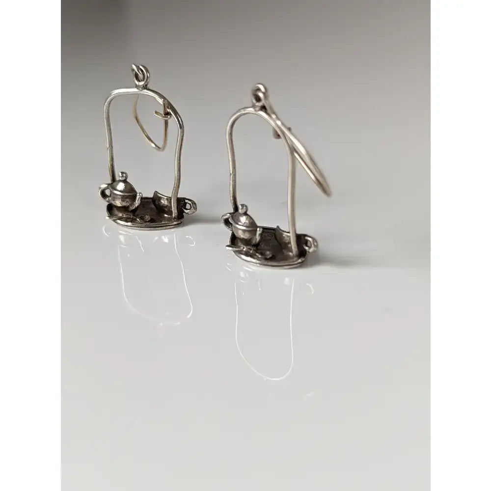 Silver steed swinging tea set dropped earrings with silver miniature teapot and cup on a delicate tray