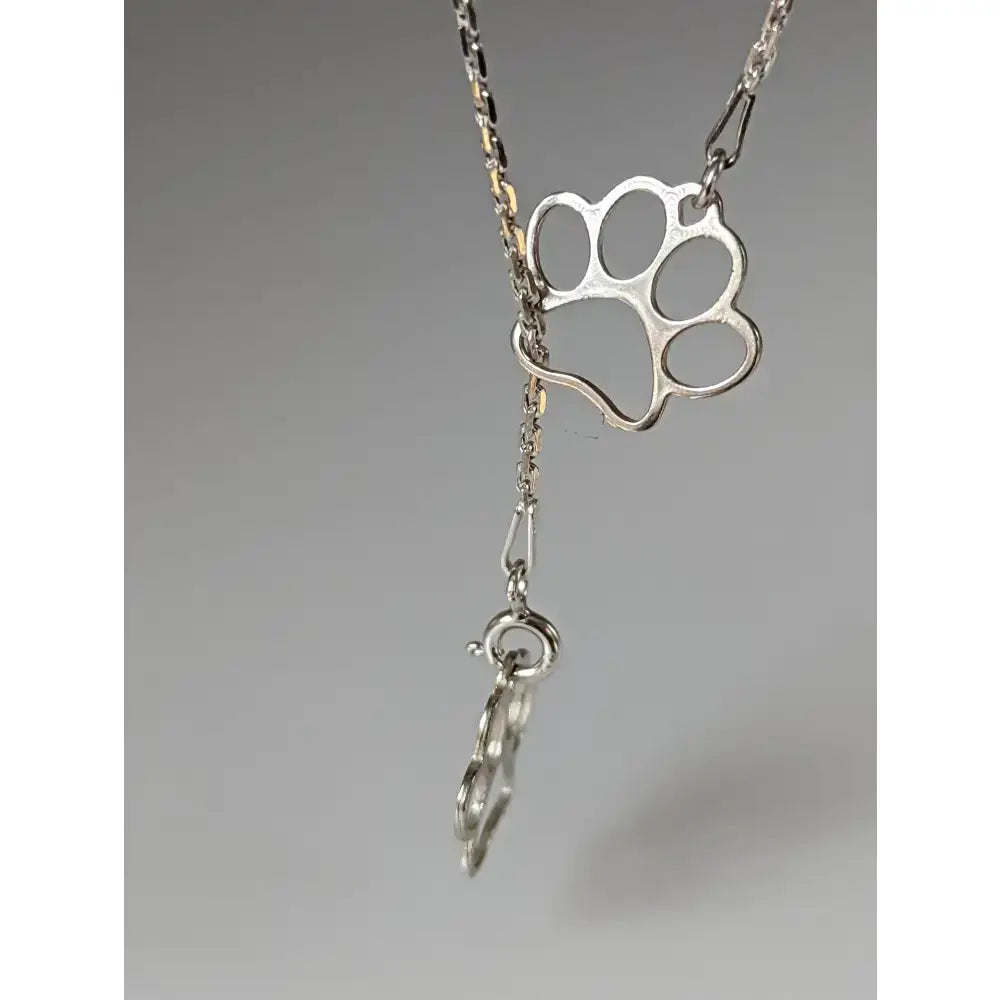Silver steed thread double paw print silver necklace with delicate chain and dangling silver paw print charm