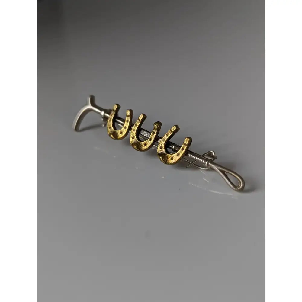 Silver steed triple silver tie bar with three gold accent horseshoe charms cane brooch with textured finish