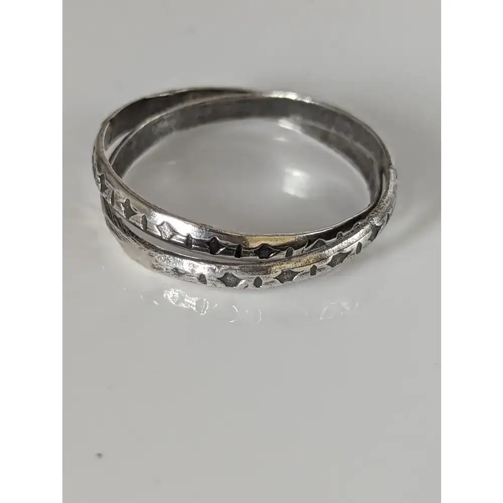 Silver steed handmade silver two interlinking bands with intricate geometric engraving and textured finish