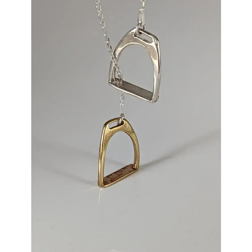 Silver steed equestrian jewelry two stirrups necklace in silver and gold with polished metallic finish