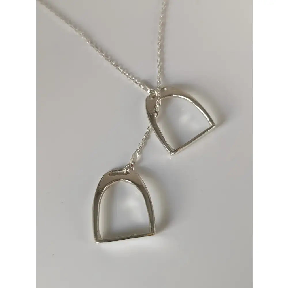 Silver steed two stirrups necklace with silver horsebit pendant and two minimalist horseshoe charms stirrups necklace