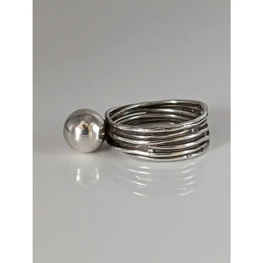 Silver steed hand-made silver ring with a wired band and large silver ball on a multi-layered textured band