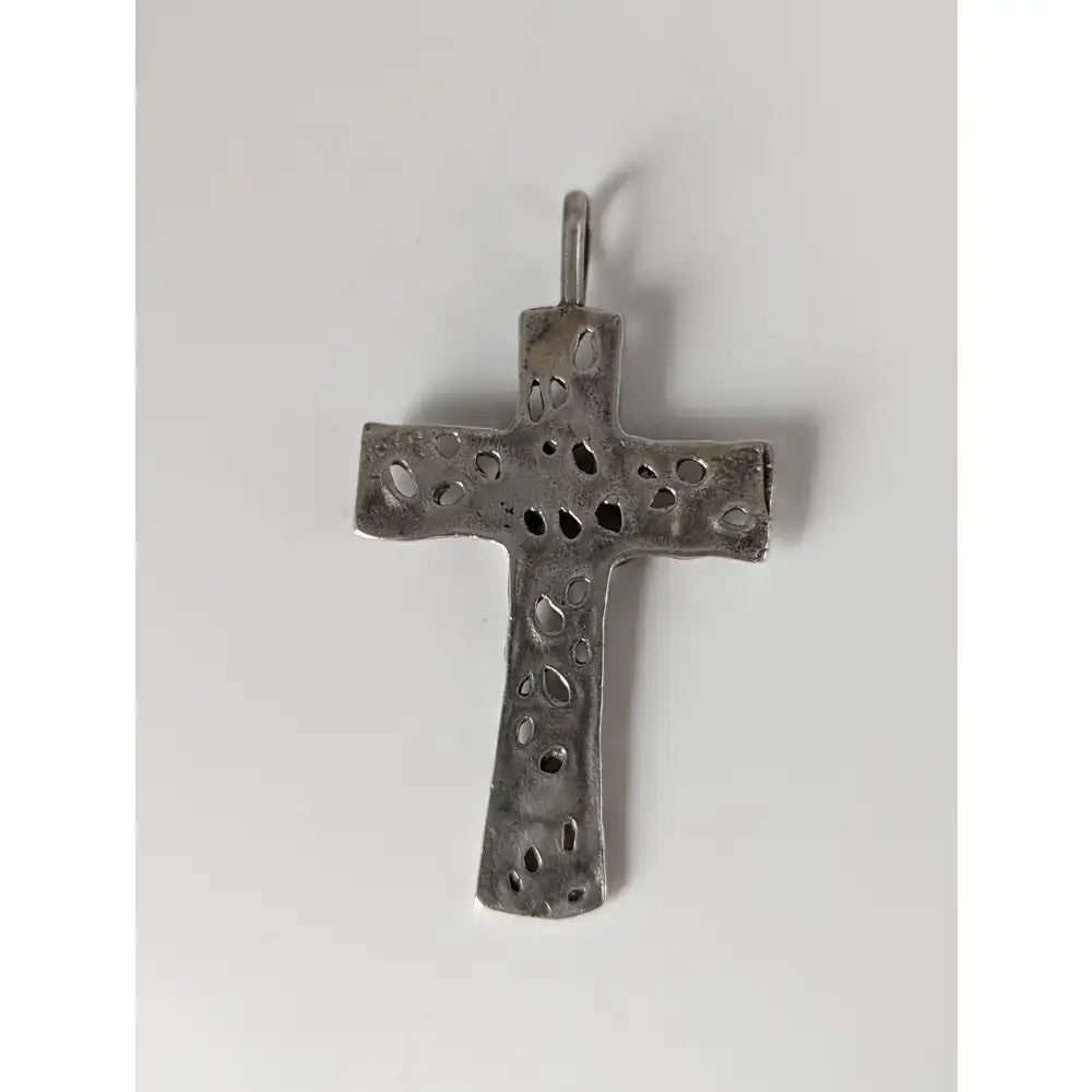 Silver steed woven cross silver pendant with hammered textured finish and intricate irregular cutout pattern in silver