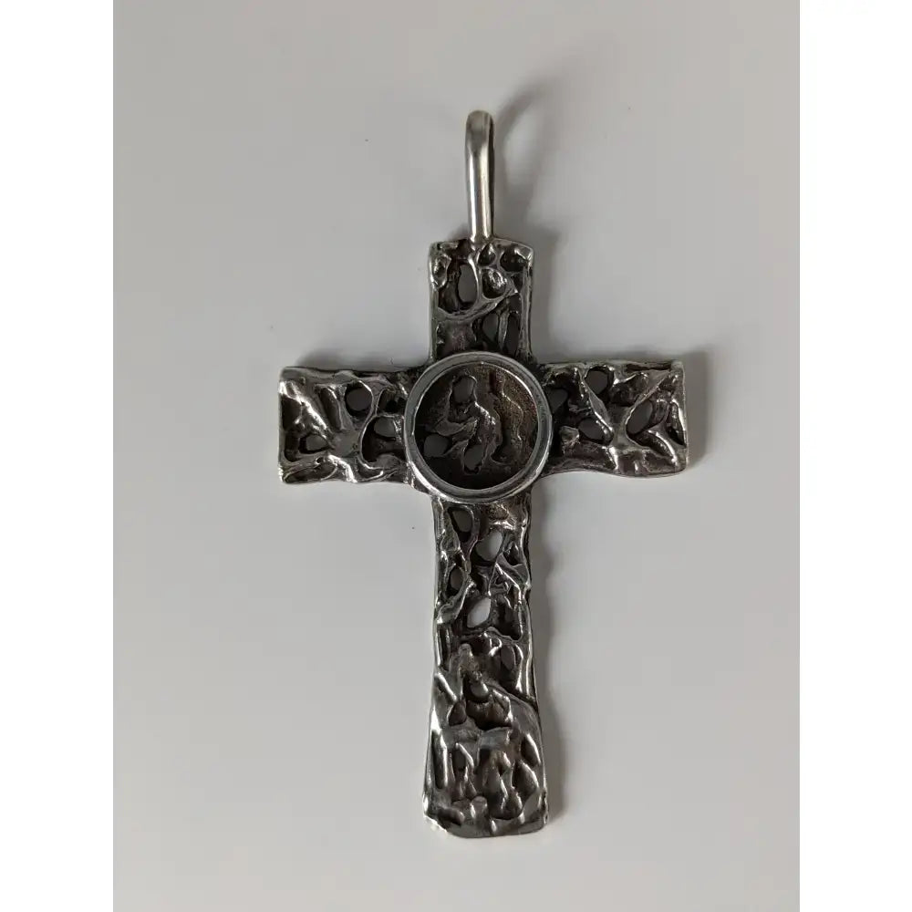 Silver steed woven cross silver pendant with intricate leaf and vine filigree and circular inset medallion centerpiece
