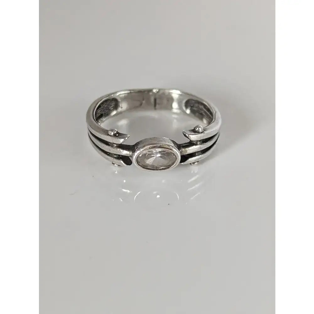 Silver steed silver zirconia antique ring featuring an oval-cut clear stone and multi-band intricate silver design