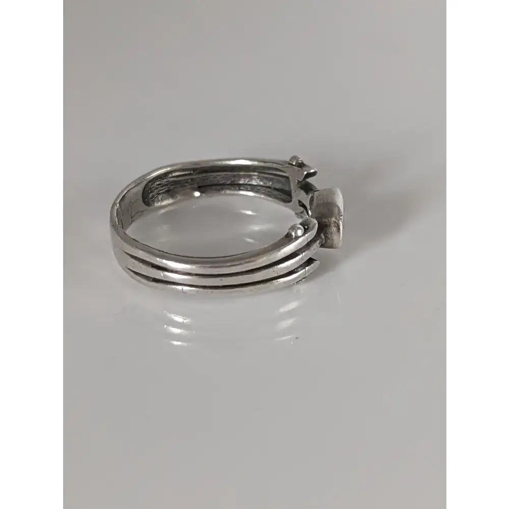 Silver steed zirconia antique ring with textured multi-band design and small rectangular stone in silver color