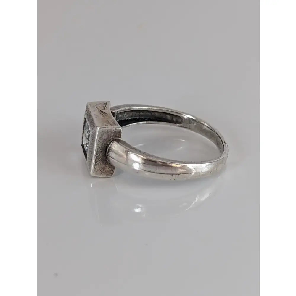 Silver steed zirconia square ring silver with dark zirconia gemstone in textured bezel setting