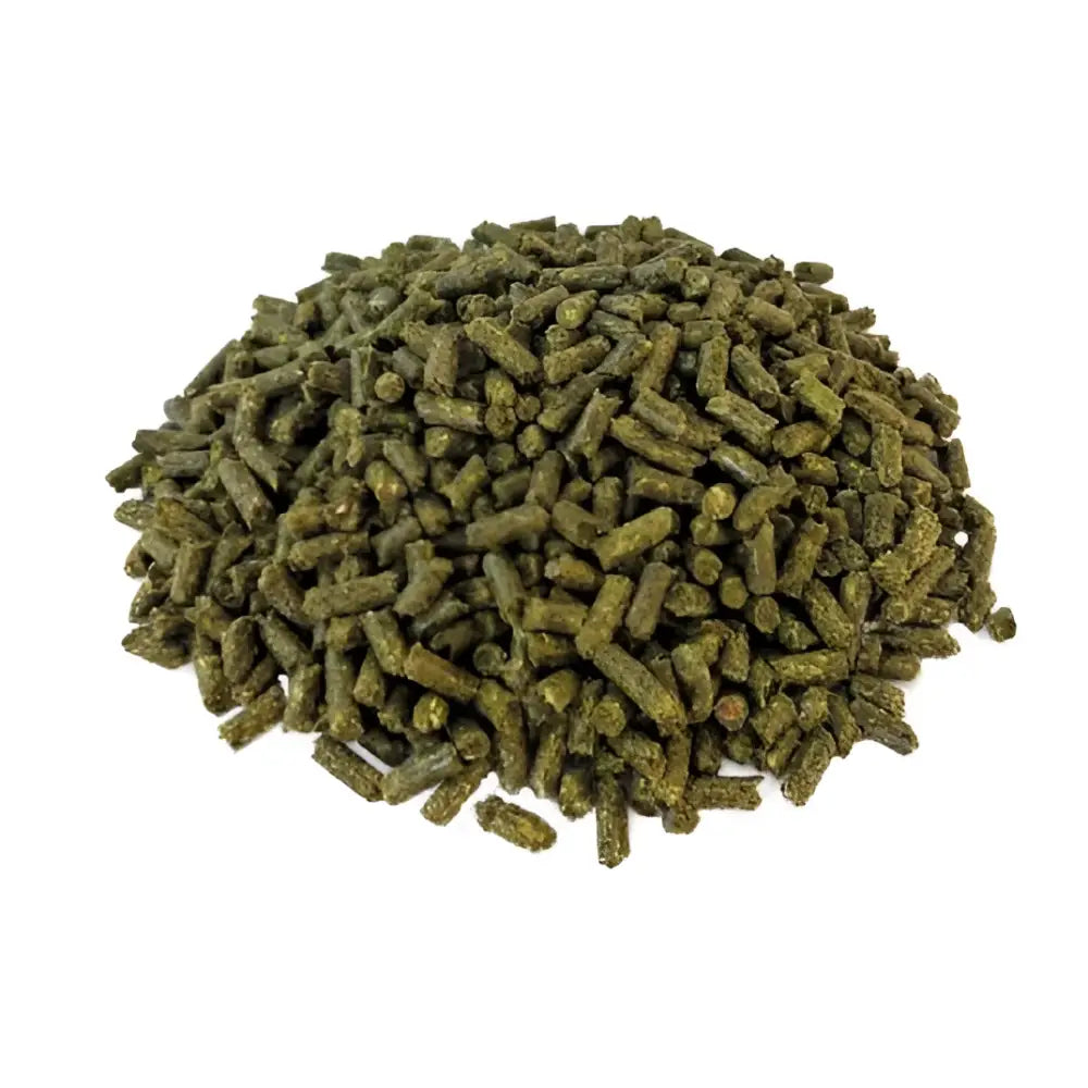 A pile of dark green cylindrical pellets from Simple System horse feeds calm balance providing targeted support