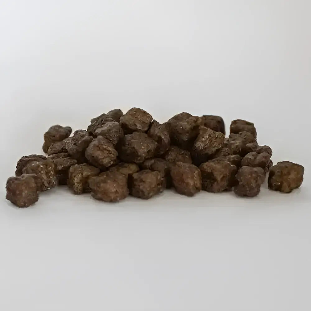 Brown irregular kibble pellets of skinners field and trial complete dry puppy food for growing dogs