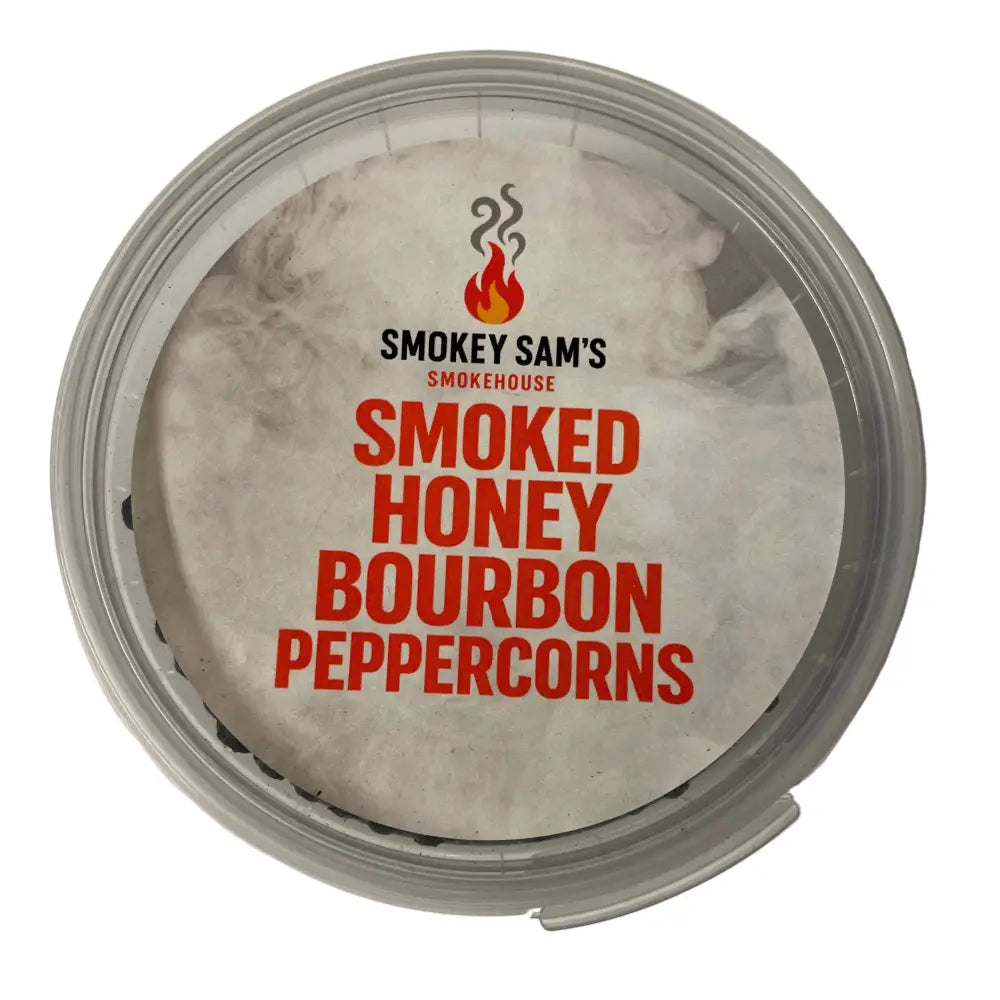 Smokey sams smoked honey bourbon peppercorns in a clear plastic container with silver lid and red label
