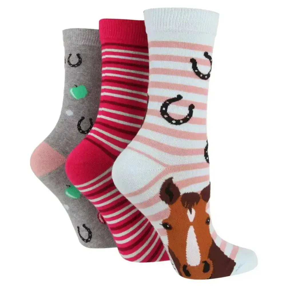 Three pairs of sockshop wild feet cotton crew socks pack horsing featuring gray red and pink horse-themed ankle socks