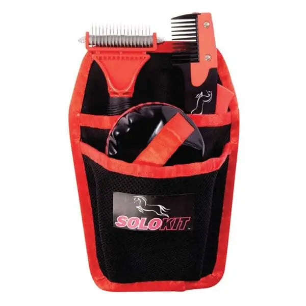 Red and black solokit horse grooming kit with mesh body and handy holster holding combs brushes and clippers and trimmers