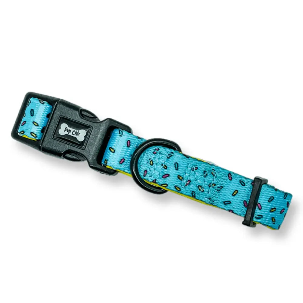 A turquoise days collar with playful donut sprinkles pattern and black buckle from pup chic perfect for daily wear