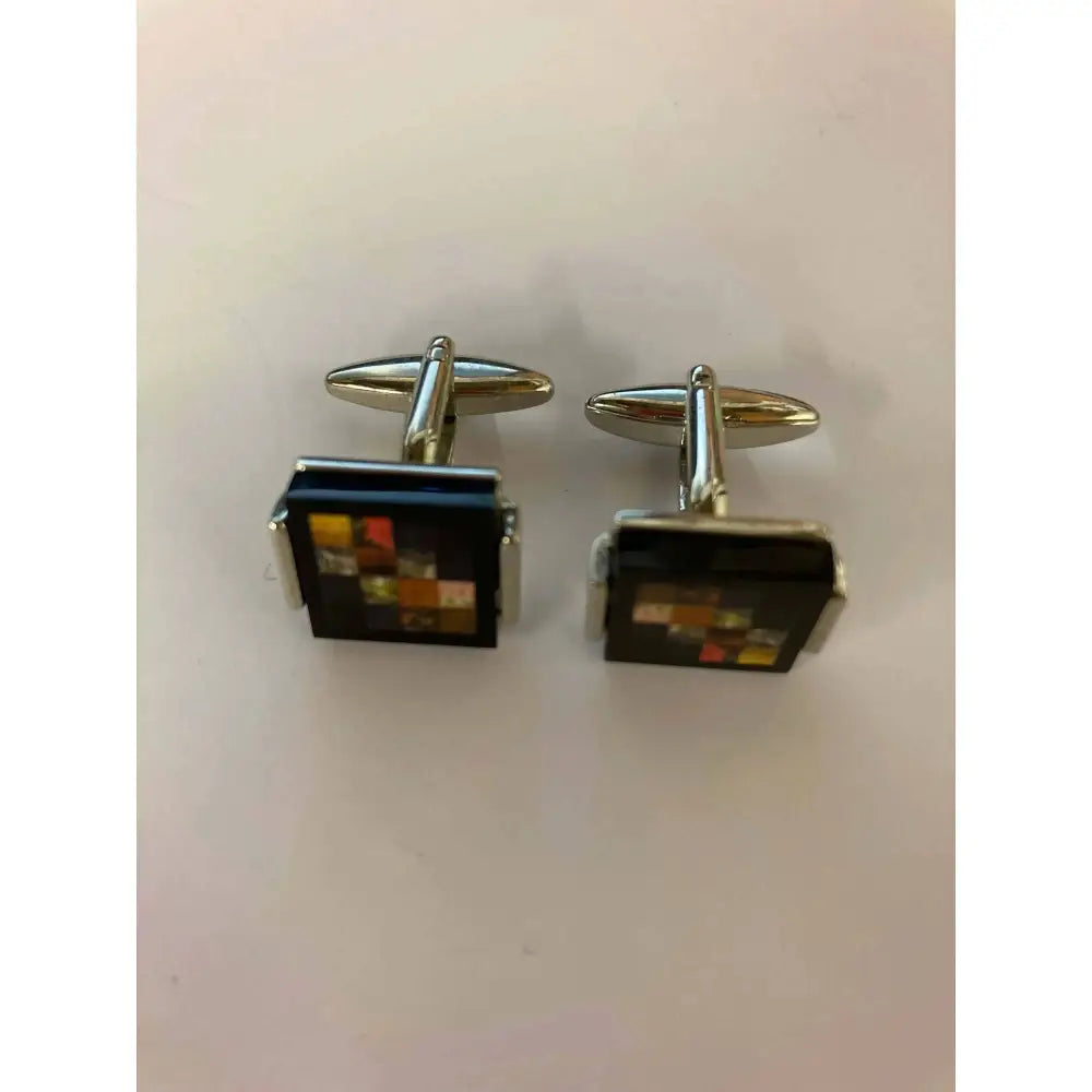 Silver-toned square cuff links with colourful squares on dark faces perfect for stylish riding apparel