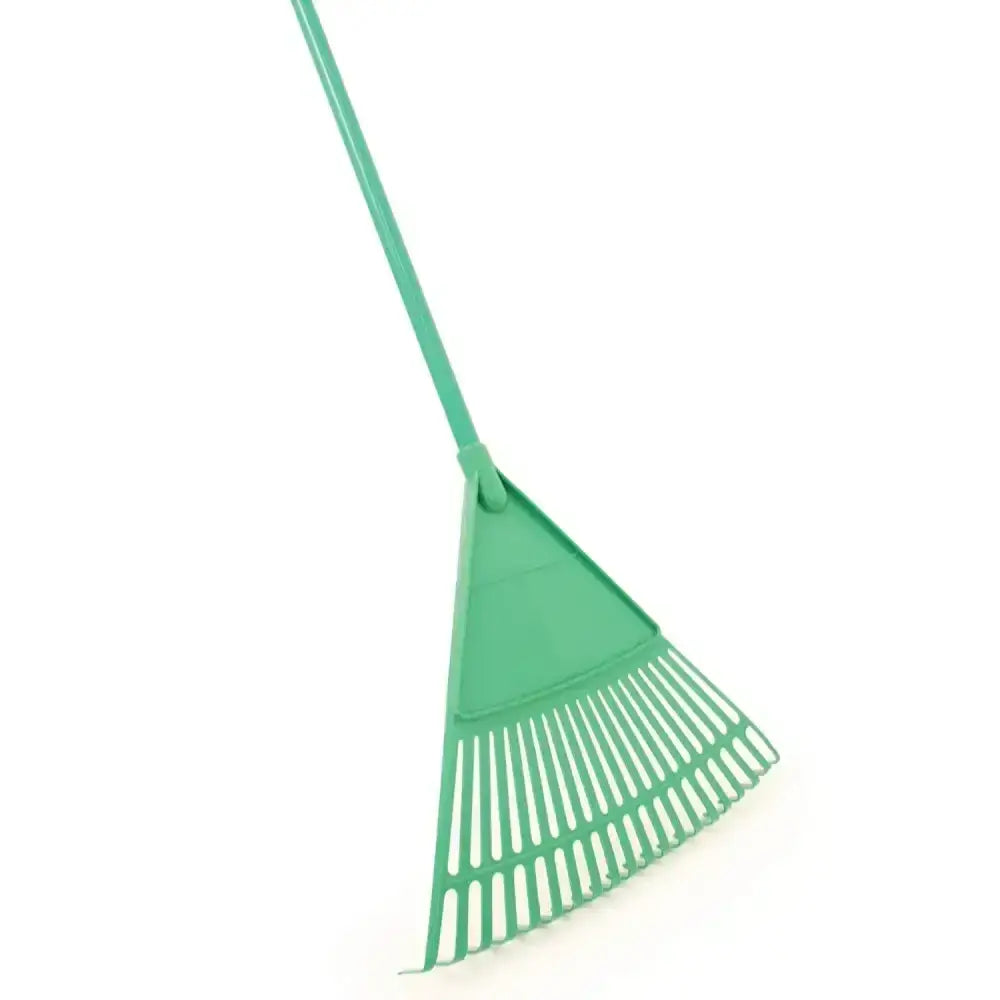 Green plastic stable rake with long handle and evenly spaced tines for use in large plastic stable maintenance