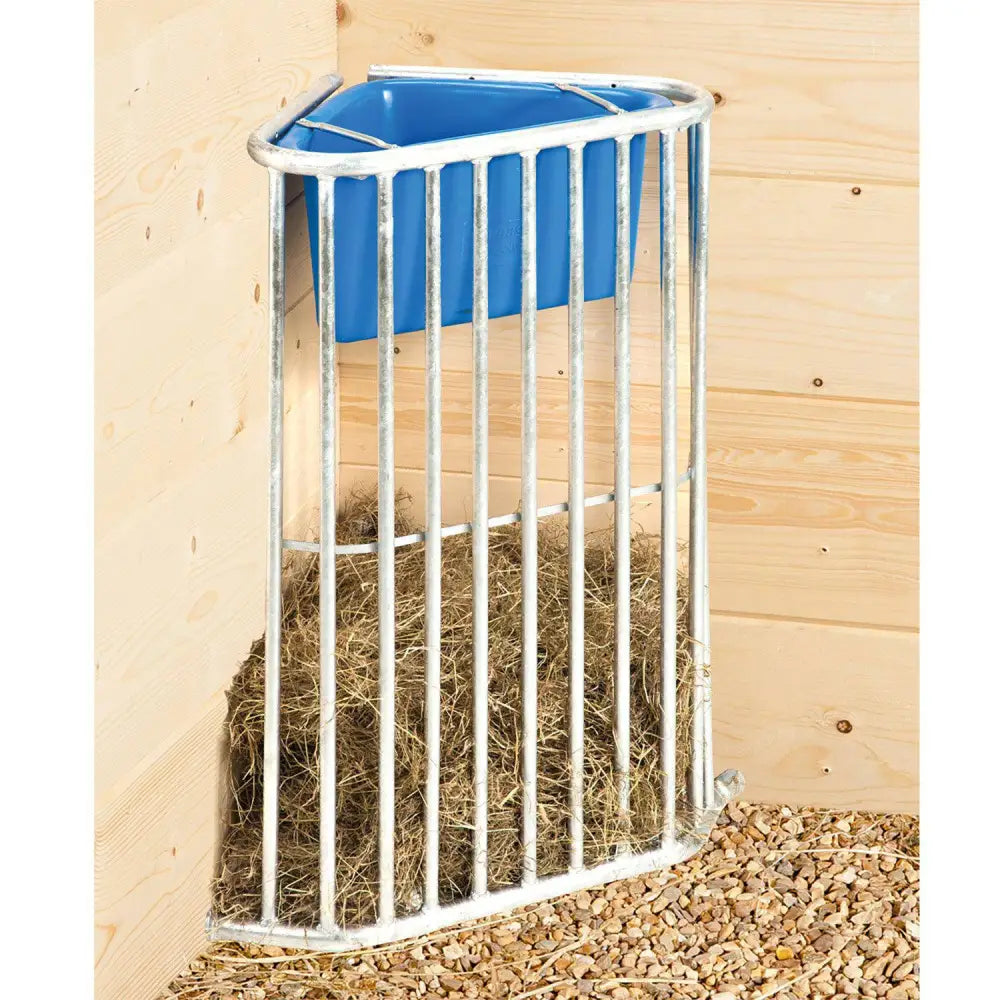 Blue plastic corner feeder with metal bars for ground level feeding horse hay stubbs munch station